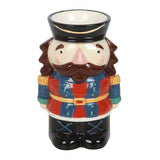 Ceramic mug shaped like a bearded man in a colorful outfit on a white background